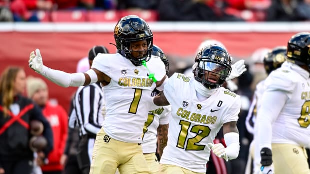Nov 25, 2023; Salt Lake City, Utah, USA; Colorado Buffaloes athlete Travis Hunter (12) and cornerback Cormani McClain (1) react after a call against the Utah Utes at Rice-Eccles Stadium